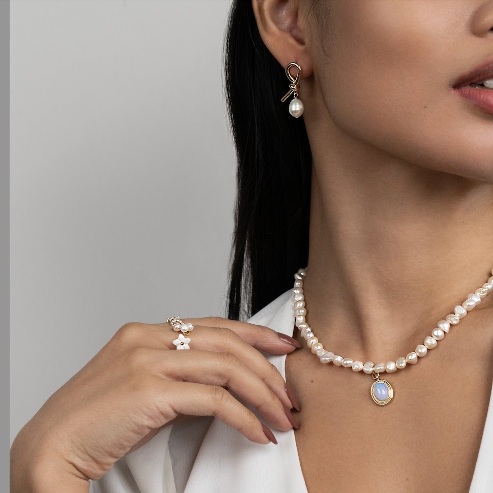 De Knotted Goud & Freshwater Pearl Oorbellen | Goud